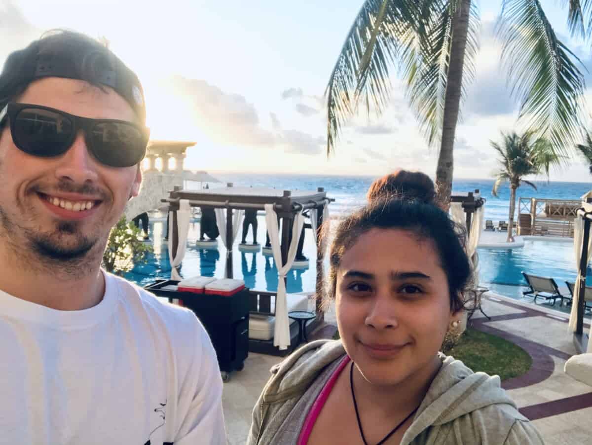 alex and his wife at a resort in cancun, mexico