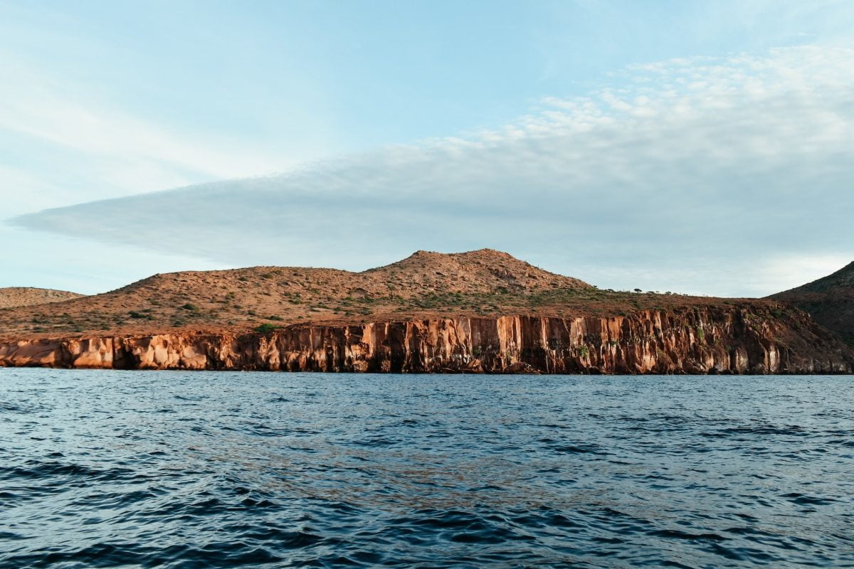 sea of cortez in Mexico with a mountain in the background